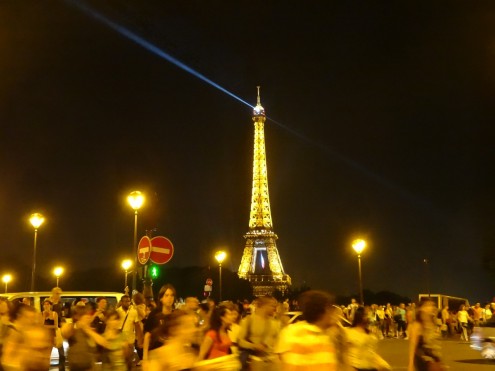 Eiffel Tower illuminating the sky