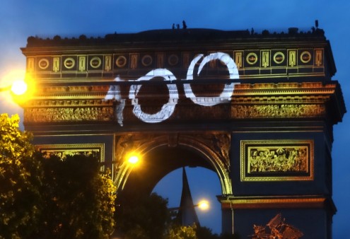 L'Arc de Triomphe, lit yellow to celebrate the completion of the 100th Tour de France
